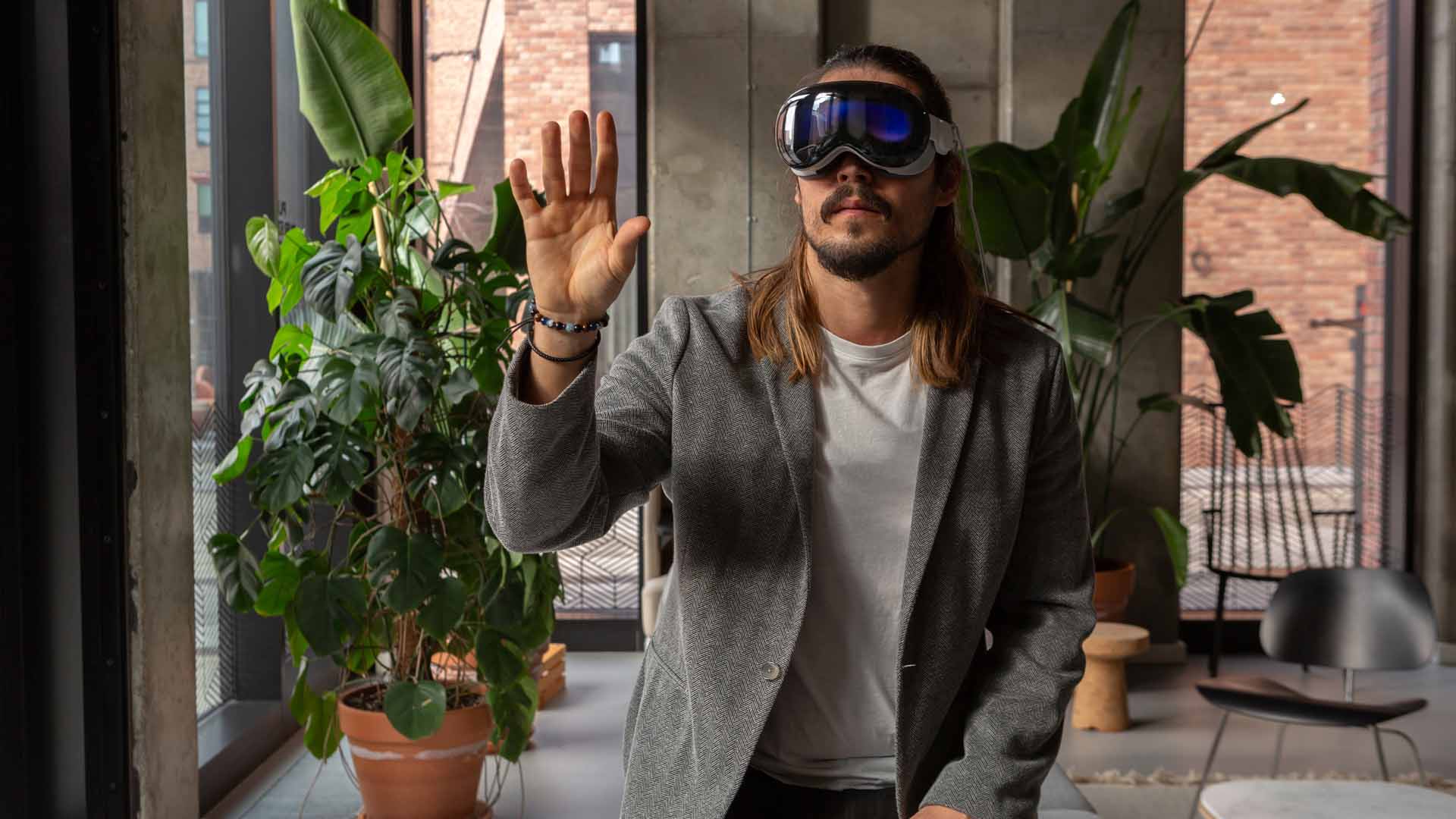 An employee using an Apple Vision Pro